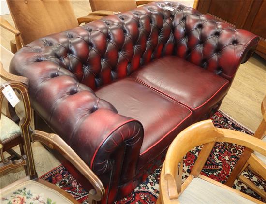 A Thomas Lloyd leather button back chesterfield W.160cm